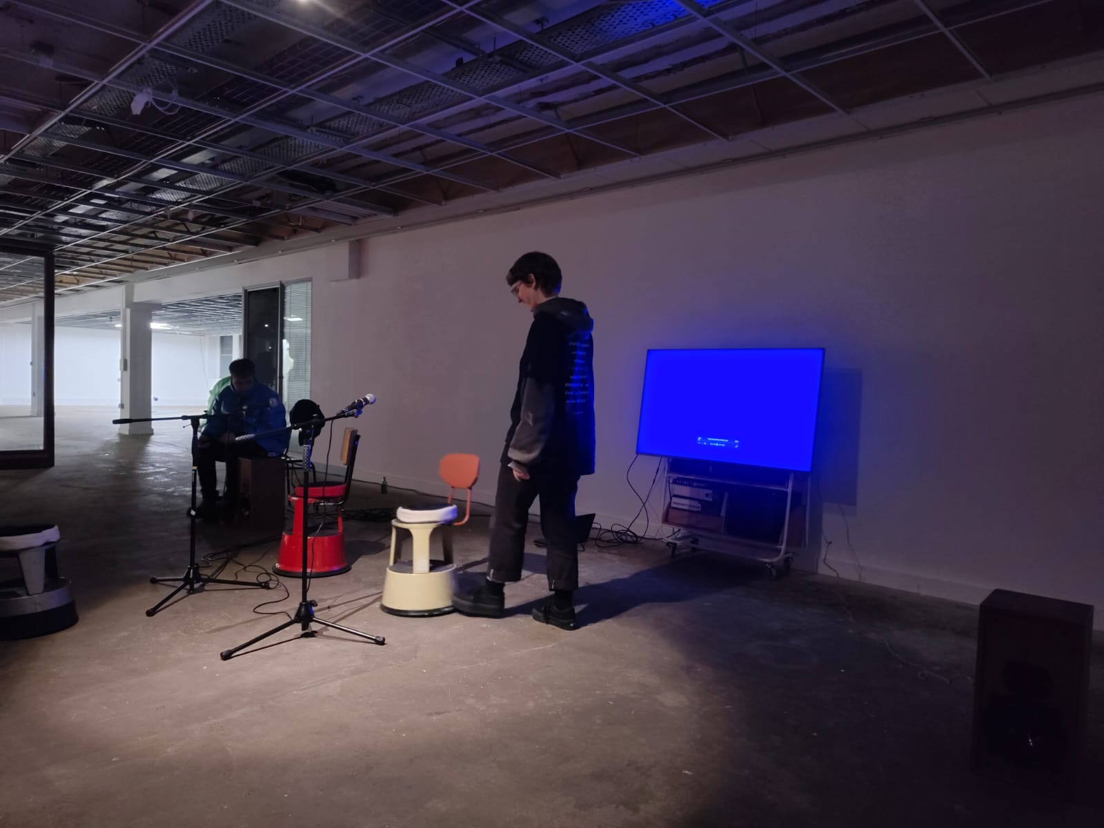 Jessa moving a kickstool into place with her foot